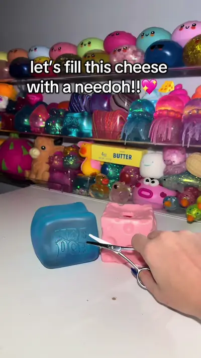 Filling a cheese squishy with a needoh!! #needoh #squishy #fidgettoys — @the.productvault