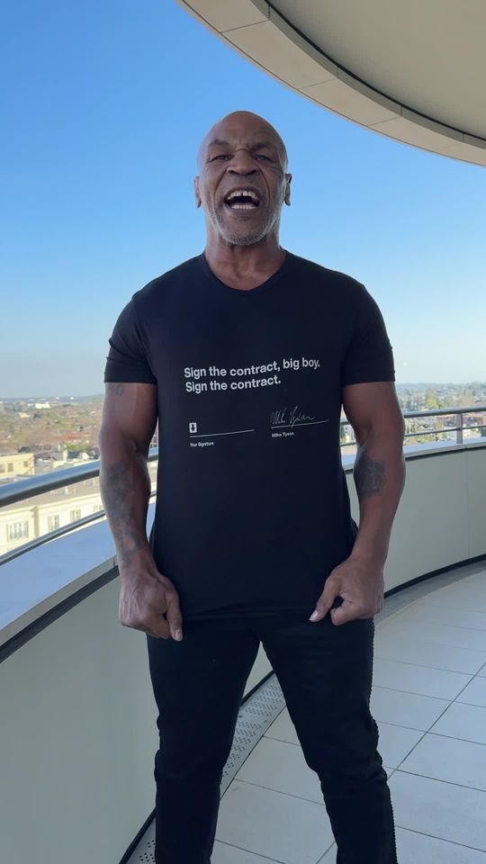 Sign the contract, big boy. @Mike Tyson Collection