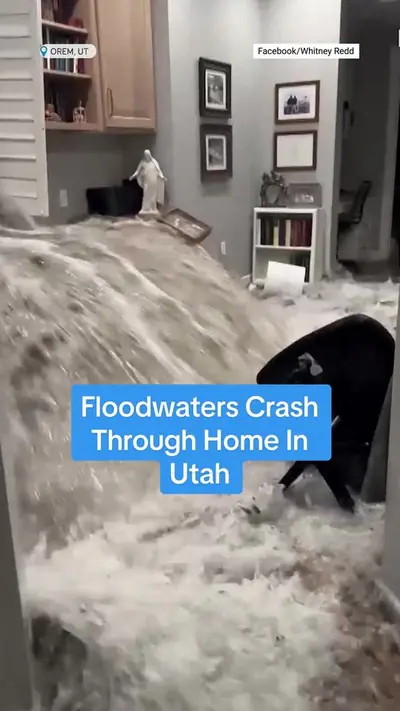 WATCH as floodwaters surge through a window and destroy a family's bas — @weather
