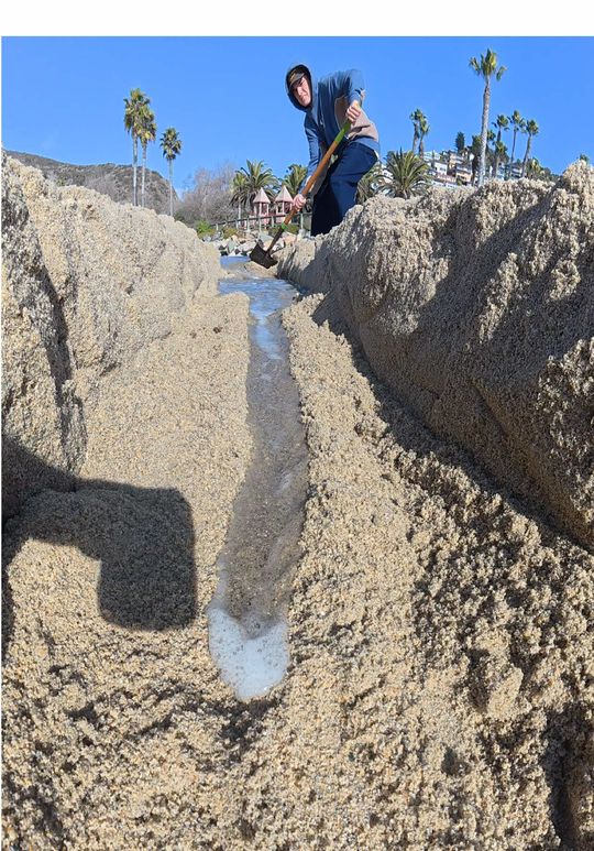The Sizzling Water Through the Sand Is Way Too Satisfying